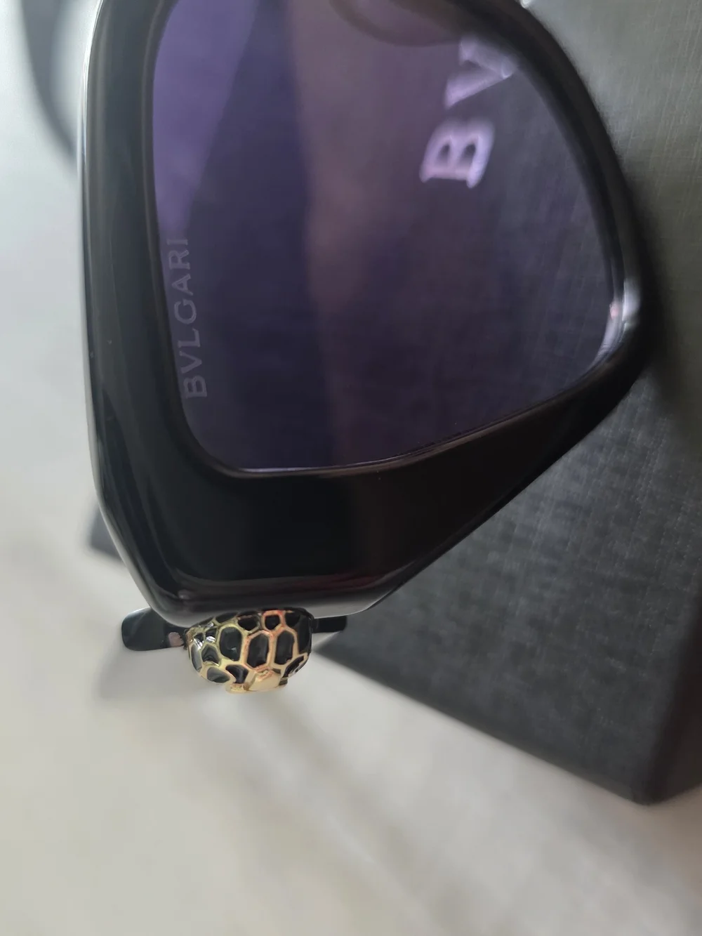 Bulgari Black Cat-Eye Sunglasses with Gold Accent